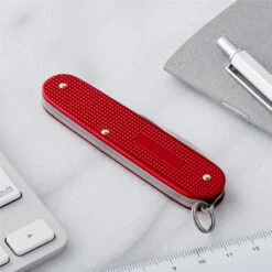 Victorinox Cadet Red Swiss Army Knife -Blade HQ SA0260120R Cadet Back Closed Lifestyle
