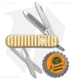 Victorinox Classic SD Precious Swiss Army Knife Woven Gold Alox 06221408G 7 Victorinox Classic SD Precious Swiss Army Knife Woven Gold Alox 06221408G -Blade HQ Victorinox Classic SD Precious Alox Gold BHQ 137943 jr bottlecap